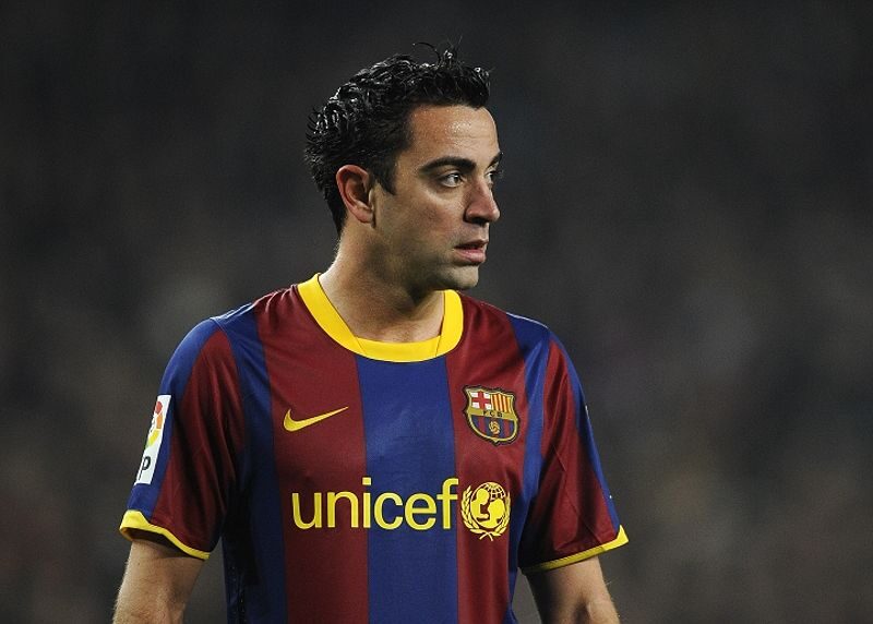 Xavi trong màu áo Barcelona.